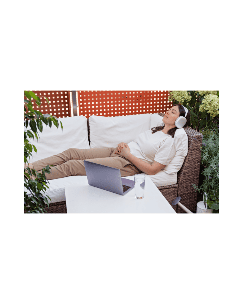 Woman relaxing with headphones during a guided hypnotherapy session
